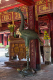 Hérons dans le Temple de la littérature tenant dans son bec u