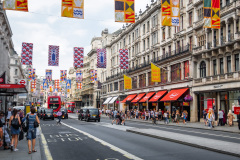 Regent"s street decorated with fanions near Hamley's toy store, London, England, UK.