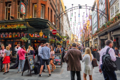 Animated street in Soho district, London, UK.